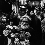 Marchand de fleurs au marché