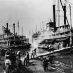 Steamboat Charging Dock in Mississippi River Port