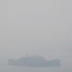 Island in Foggy Weather