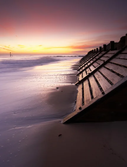 Coucher de Soleil sur la Plage avec Palissades
