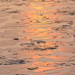 Coucher de soleil sur glace brisée