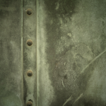 Texture d'une surface métallique vieillie avec rivets alignés