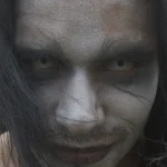 Portrait d'homme avec maquillage artistique sombre