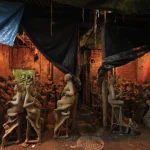 Atelier de sculpture en terre cuite avec artisan