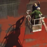 Travailleurs Sur Nacelle Rénovant Mur Avec Système Haute Pression